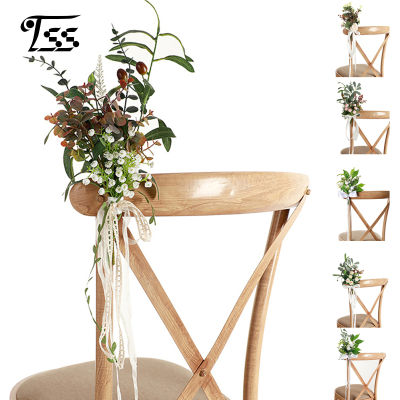 เก้าอี้เทียมด้านหลังดอกไม้หลายสีดอกไม้ทางเดินสำหรับตกแต่งเก้าอี้งานแต่งงานกลางแจ้ง
