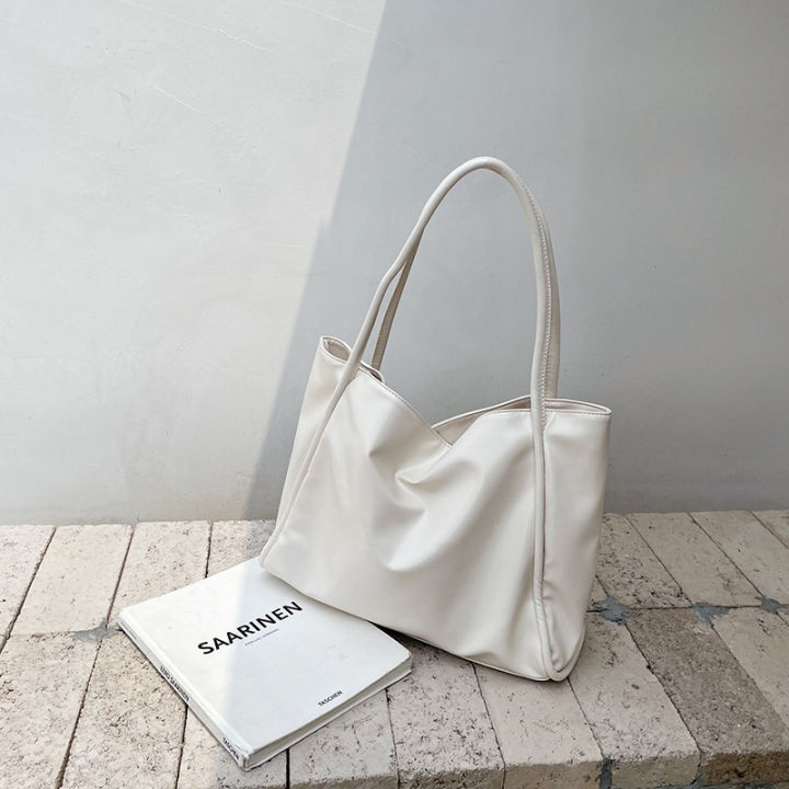 กระเป๋าสไตล์เกาหลี-women-s-2023-new-portable-big-bag-tote-bag-special-interest-design-versatile-large-capacity-shoulder-bag-casual-underarm-bag