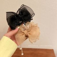 [COD] South Koreas new temperament pearl tassel bow clip hair shark back head accessories for women