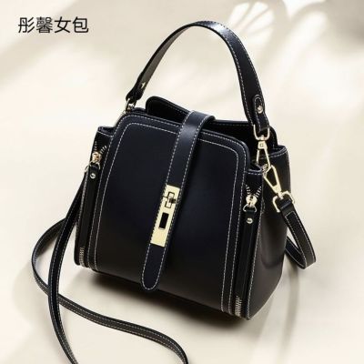 Tongxin กระเป๋าผู้หญิง 2023 แฟชั่นใหม่กระเป๋าหนังดีแฟชั่นร้อยชิ้นความจุขนาดใหญ่ความรู้สึกระดับสูงสีทึบถังถือกระเป๋าสะพาย