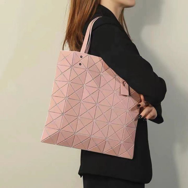 issey-miyake-march-limited-vibration-gold-series-six-grid-matte-metal-polarized-matte-hand-held-shoulder-tote-handbag