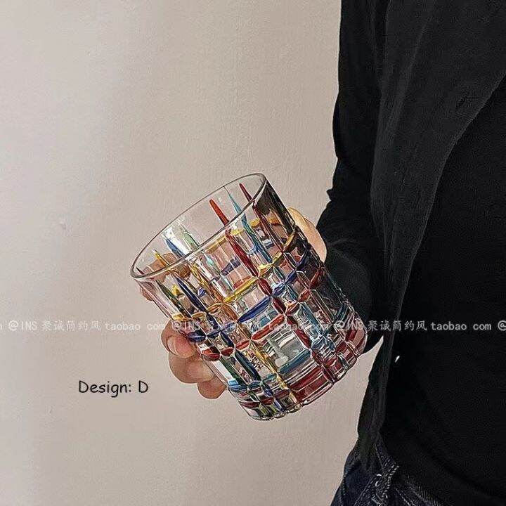 italian-designer-with-the-same-hand-painted-middle-aged-glass-whiskey-cup-reflect-rainbow-luster-painted-water