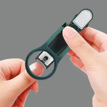 Nail cutter with store magnifier