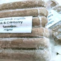 One Kilo (12 Sausages) Pork &amp; Cranberry - A superb seasoning that is mildly spiced. The cranberries come to the forefront here giving a fruity richness to your meat. Delivered frozen by our transport.