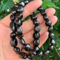 ก้อนอัญมณี Shungite แท้สร้อยข้อมือ Shungite สร้อยข้อมือแบบยืดได้การป้องกันแรงดันไฟฟ้าการแผ่รังสีที่สร้อยหินร่วงลงมา