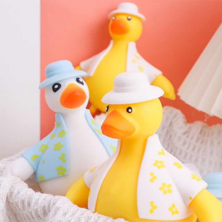 creative-flower-clothes-q-play-duck-decompression-vent-toys-cute-sell-cute-refueling-little-yellow-duck-prank-toys-k37