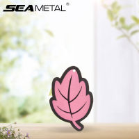 E.g. SEAMETAL Leaves Style Car Air Freshener Car Perfume Pendant Interior Aromatherapy Diffuser Solid Flavor. Auto Smell Accessori ！