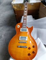 Gibson Les Paul กีตาร์ไฟฟ้ามาตรฐาน Honey Burst Flame Maple Top Chrome Hardware คุณภาพสูง