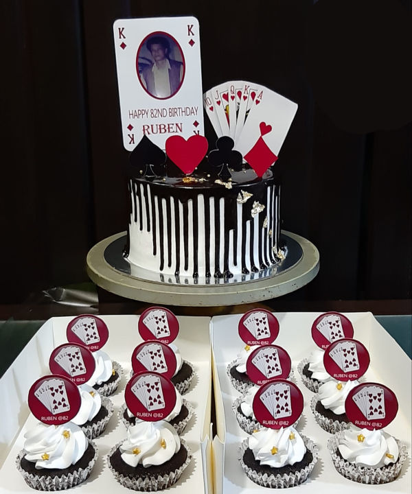 Three tier white poker card theme cake with Ace card on top.JPG