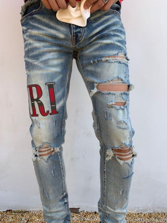 Ripped jeans clearance with underlayer