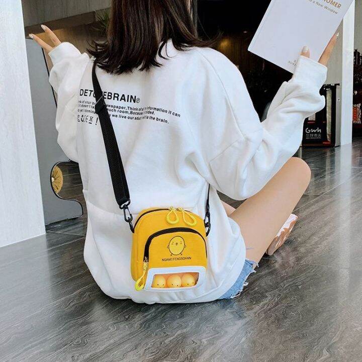 hot-sale-send-sachet-canvas-bag-female-2023-high-end-sense-new-students-all-match-cartoon-cute-shoulder-messenger