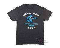 Mega Man Running และ Gunning ตั้งแต่ 1987 Gamer ที่ได้รับอนุญาตผู้ใหญ่ TShirt