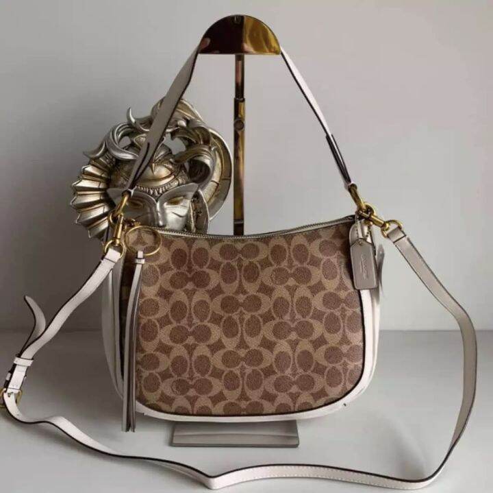 Coach 52577 Tan / Chalk Sutton Crossbody Hobo in Signature Coated