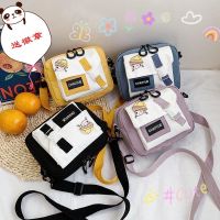 COD ndcn549 Lovely female Japanese canvas bag shoulder little bread joke可爱帆布包包女日系单肩小方包百搭撞色学生斜挎包潮 NG服饰店