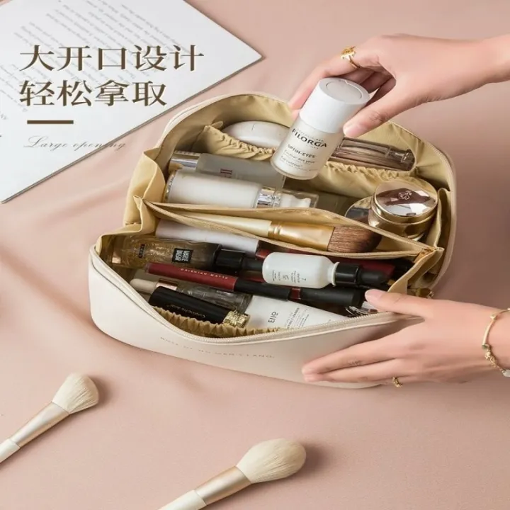 high-end-muji-2023-new-high-end-pillow-cosmetic-bag-xiaohongshu-same-style-makeup-storage-bag-large-capacity-portable-travel-bag