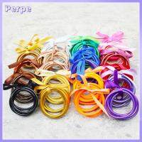 PERPE 5pcs/lot สัญลักษณ์นำโชค ชุดกำไลข้อมือ นุ่มนุ่มๆ กลิตเตอร์ กำไลข้อมือซิลิโคน เทศกาลเครื่องประดับ สีทองอ่อน กำไลข้อมือพุทธ ผู้หญิงผู้หญิงผู้หญิง