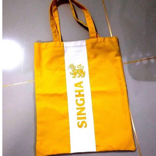 กระเป๋าเคียงสิงห์-ขนาด-a4-ทำจากผ้าแคนวาสสีเหลืองสด