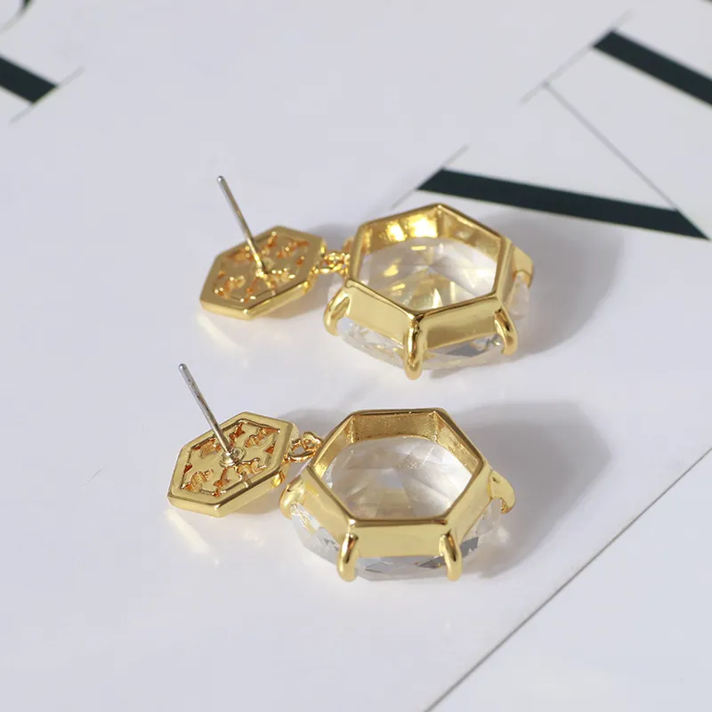 TORY BURCH earrings Tory Burch fresh hollow hexagonal logo six-claw inlaid  crystal tb earrings female 
