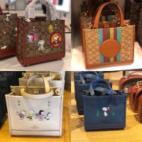 แท้100% COACH  DEMPSEY TOTE 22 IN COLORBLOCK SIGNATURE CANVAS WITH DISCO PATCHES (8.5นิ้ว)