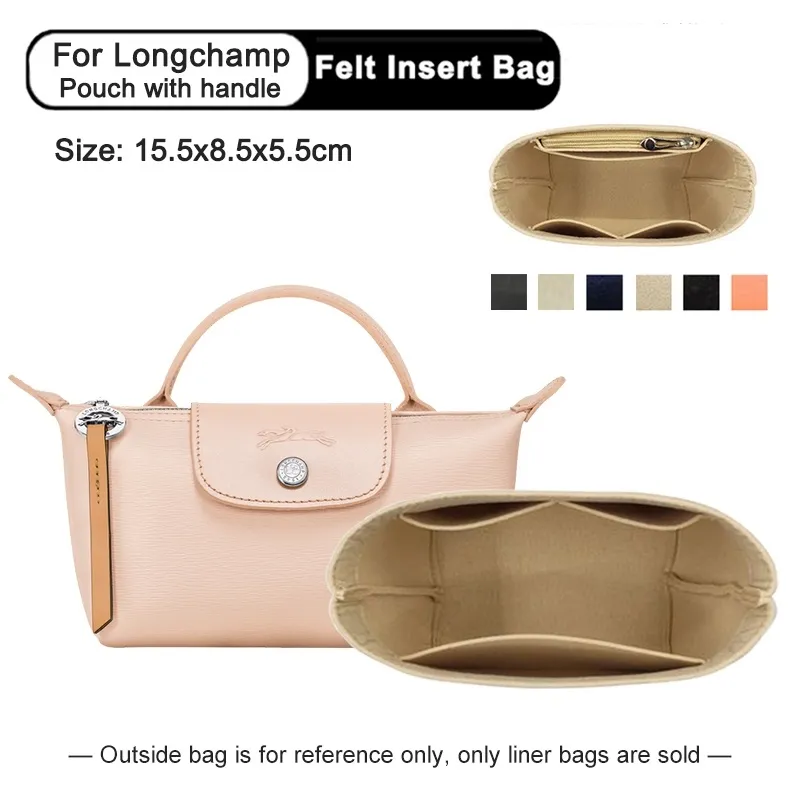 Shop Longchamp Le Pliage City Pouch with Handle