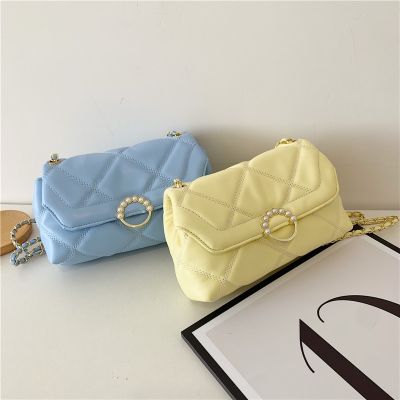 Fashion color soft bump inclined shoulder bag bag 2022 new restoring ancient ways in the spring and autumn contracted one shoulder handbag commuting to packets