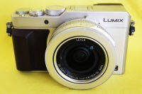 Panasonic LX100 4K (analog Leica D-Lux Type 109) Silver Brown camera 3.1X LEICA DC VARIO-SUMMILUX F1.7-2.8 24-75mm Lens, 4/3" MOS sensor Lumix DMC-LX100 4K (3840×2160) Four Thirds sensor  eye level EVF (2,764k dot) Optical Image Stabilizer POWER O.I.S