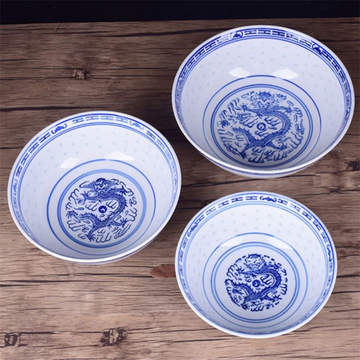 jingdezhen-ชามน้ำซุปก๋วยเตี๋ยวลายมังกรสีน้ำเงินและเครื่องกระเบื้องสีขาวชามข้าว-guanpai4บนโต๊ะอาหารชามใส่ผลไม้สุดสร้างสรรค์