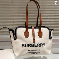 ดั้งเดิม Burberry กระเป๋าช้อปปิ้งของผู้หญิงใหม่กระเป๋าแฟชั่นกระเป๋าความจุขนาดใหญ่กลางแจ้งกระเป๋าผ้าใบทุกสิ่งที่คุณแม่ Bag32 * 28ซม.