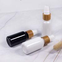 10ml 20ml 30ml 50ml porcelain white black glass spray bottle cosmetic Sanoflore filled container with wooden bamboo pump