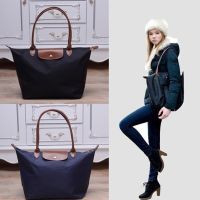 COD DSGERTRYTYIIO French leather womens bag long handle single shoulder handbag waterproof nylon travel dumplings bag medium and large Tote bag