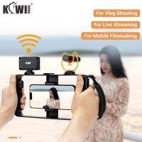 Kiwifotos แท่นขุดเจาะวิดีโอสำหรับสมาร์ทโฟน ที่จับกันสั่นของโทรศัพท์มือถือและกรงสำหรับทำฟิล์มพร้อมรีโมทไร้สายและที่ยึดรองเท้าแบบเย็นสำหรับการถ่ายภาพ Vlog ของสมาร์ทโฟน dnp