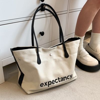 Large capacity big canvas bag female sense of the new 2022 senior western style joker single shoulder bag web celebrity sense tote bags