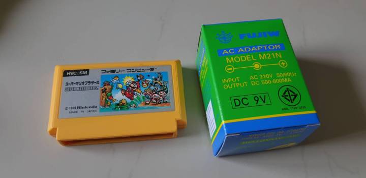 สินค้าราคาพิเศษครับ-ชุดเครื่องเกมส์-famicom-เกมส์สนุกวัยเด็ก-ประกอบด้วยเครื่องเกมส์-famicom-รุ่นมีสาย-av-เลยในตัว-พร้อมหม้อแปลงฟูจิวรุ่นท๊อปไฟสเถียน-ไฟแรง-ทน-เล่นเกมส์แล้วภาพไม่กระตุก-แถทด้วยตลับเกมส์