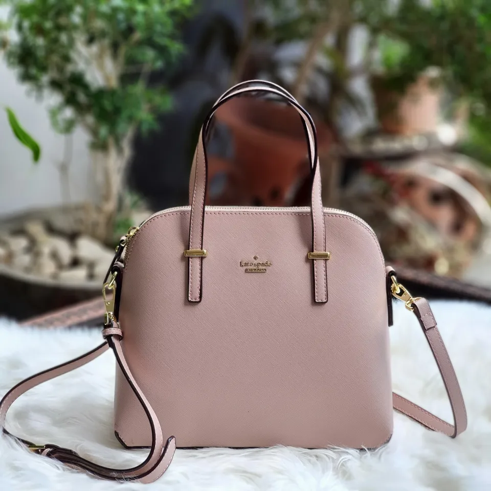 pastel pink pink kate spade purse