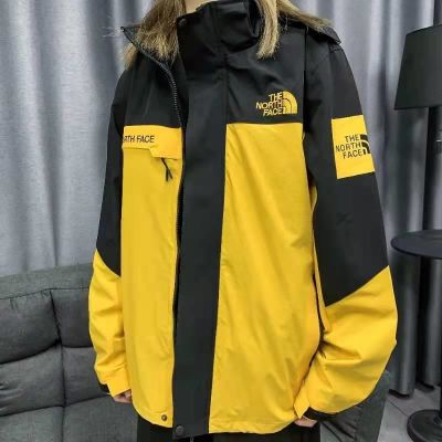 ♣☾NORTH FACE เสื้อโค้ทกีฬาเสื้อผ้าชั้นนอกปักลายสำหรับคู่รักหญิงและชายมีฮู้ดเสื้อคลุมเสื้อกันลมแบบบางคู่ Jaket Daki Gunung ล่าสุด