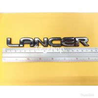 โลโก้ lancer  สีเงินขอบดำ