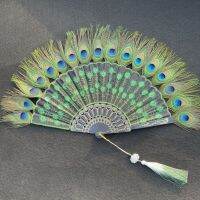 ✉☽  The peacock feather fan embroidered sequined black rod fans in wing chun gift of folding fan fan