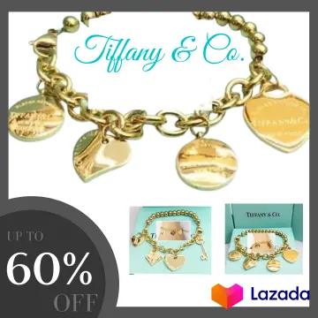 Travel charms | Tiffany and co bracelet, Tiffany charm bracelet, Charm  bracelet