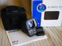 Olympus VF-4  VF4 Electronic Viewfinder for PEN and OM-D Cameras in Box, V-F4 EVF-4 EVF4 ช่องมองภาพอิเล็กทรอนิกส์รุ่นนี้มีอัตราการขยาย 1.48x* ที่เทียบเท่ากับอัตราการขยายของกล้อง DSLR แบบ full-frame, หน้าจอ LCD ความละเอียด 2.36 ล้านดอท และครอบคลุมพื้นที่กา