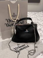 Vivienne กระเป๋า Westwood ใหม่เกี๊ยวลายจระเข้แปซิฟิกตะวันตก2023กระเป๋าแบบหนีบแขนความรู้สึกอาวุโสโซ่กระเป๋าหลังจาก Saturn BaoChao ปากทอง