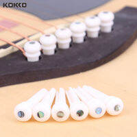 [พร้อมสต็อก] Kokko กระดูกหอยเป๋าฮื้อสะพาน Pins + เล็บดึงสีขาวสำหรับกีตาร์พื้นบ้าน 6 ชิ้นอุปกรณ์ทดแทนรุ่น: mx0139d