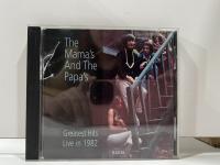 1 CD MUSIC ซีดีเพลงสากล THE MAMAS AND THE PAPAS GREATEST HITS LIVE IN 1982 (A17G37)