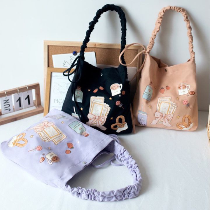 koreafashionshop-kr1781-กระเป๋าผ้าแคนวาสสะพายข้าง-สายสะพายแบบรูด-ลายการ์ตูนน่ารัก