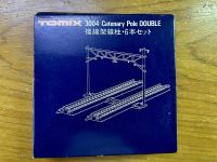 Brand new Tomix N 3004 Catenary Pole Double, unused 6 pcs. Tomix N 3004 Catenary Pole Double ของใหม่ ยังไม่ใช้ 6 ชิ้น