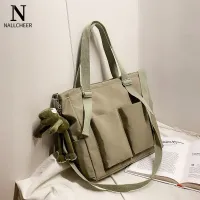 [NALLCHEER Canvas bag large capacity solid color casual slung shoulder bag Korean student bag tutorial class bag with pendant.,One More Bag Canvas bag large capacity solid color casual slung shoulder bag Korean student bag tutorial class bag with pendant.,]