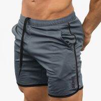 กางเกงขาสั้น Men Quick-drying Sports Shorts Training Fitness Short Pants with Pockets M-3XL