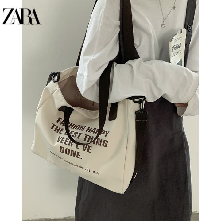 2023-zaraเย็บปักถักร้อย-zar-กระเป๋าผ้าใบผู้หญิงอินเทรนด์-ใหม่ฤดูใบไม้ผลิและฤดูใบไม้ร่วงกระเป๋ากระเป๋าสีตัดกันแฟชั่นอเนกประสงค์กระเป๋าคนส่งเอกสารลำลองความจุขนาดใหญ่