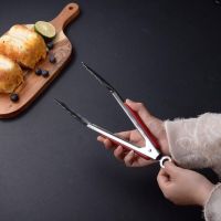 [Fast delivery] Stainless steel food tongs bread barbecue steak cake baking tongs kitchen anti-scalding food tongs Thickening and anti scaling