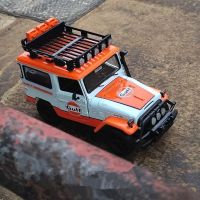 1:24 FJ40 FJ CRUISER Gulf รุ่นรถโลหะผสมของเล่นโลหะ Diecast จำลองรถออฟโรดดัดแปลงโมเดลรถของเล่นของขวัญ