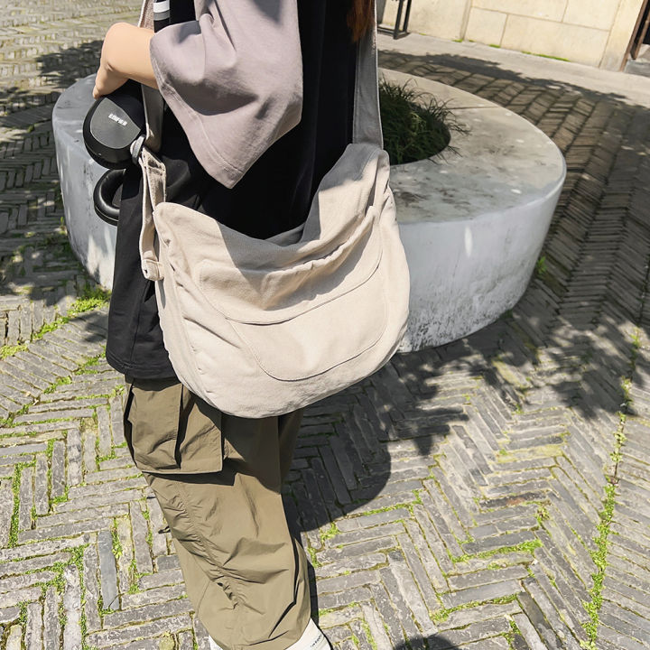 กระเป๋าสะพายพาดลำตัวผ้าใบแฟชั่นความจุสูงกระเป๋าหิ้วฮาราจูกุสำหรับวัยรุ่น